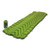 side front view of a layed out sleeping pad and a packed away sleeping pad  from a green lightweight, comfortable, cost effective, packable,  sleeping pad made from light fabrics and polyester