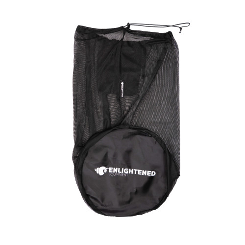 a flat lay of of the black mesh storage sack that quilt will be shipped with