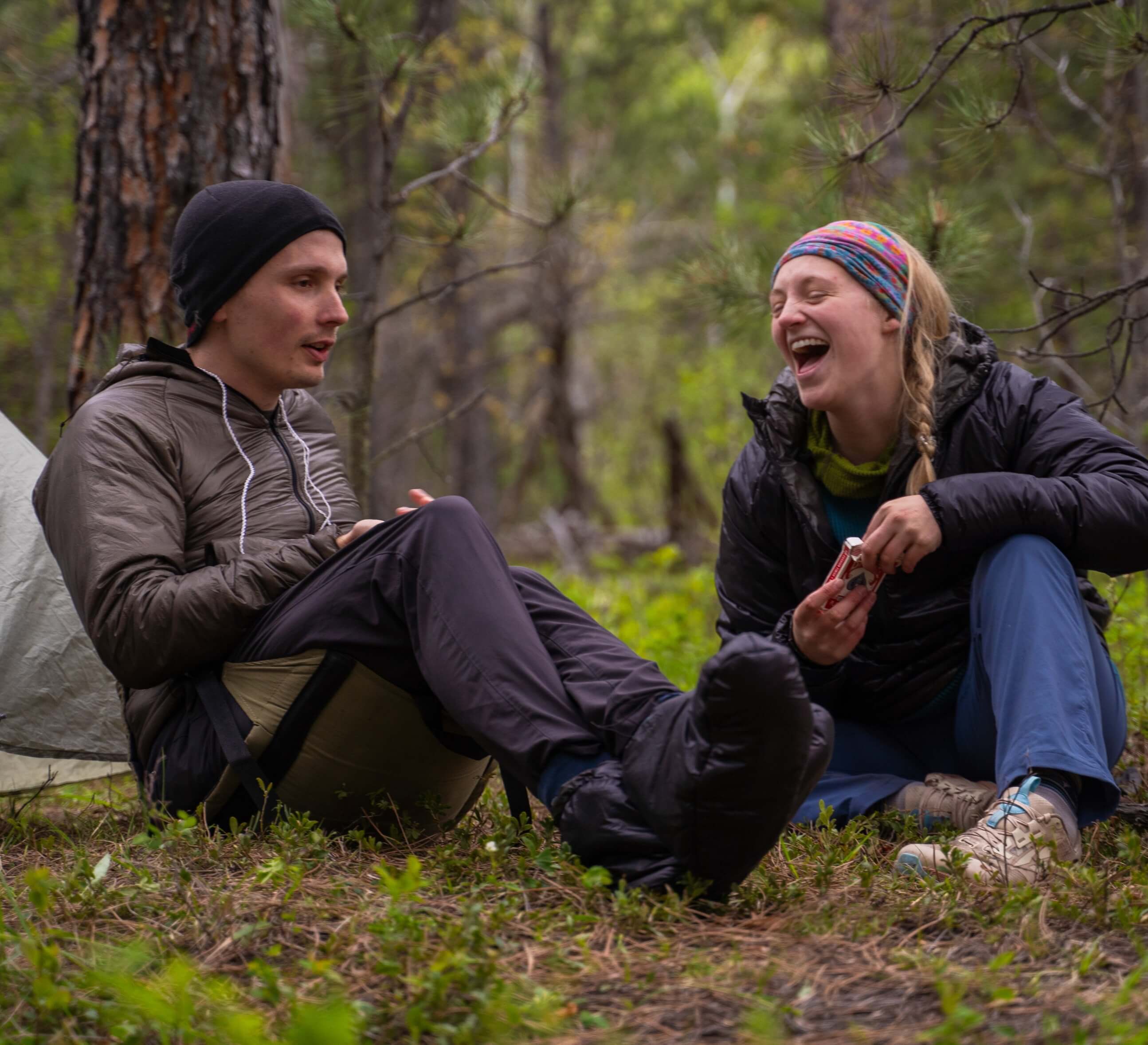 Review image 2 - Two people at camp laughing, wearing torrid jackets and pullovers